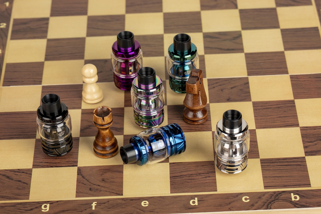 Assorted vape accessories including drip tips, cables and cases